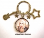 B4.92 bijou lady gaga porte-clés bijou fantaisie bronze cabochon verre célébrité chanteuse music musique guitare étoile star (série 7)
