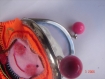 Porte monnaie matriochka poupée russe fait main en feutrine tissu orange et noir 